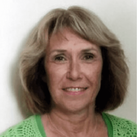 Woman posing against a white background